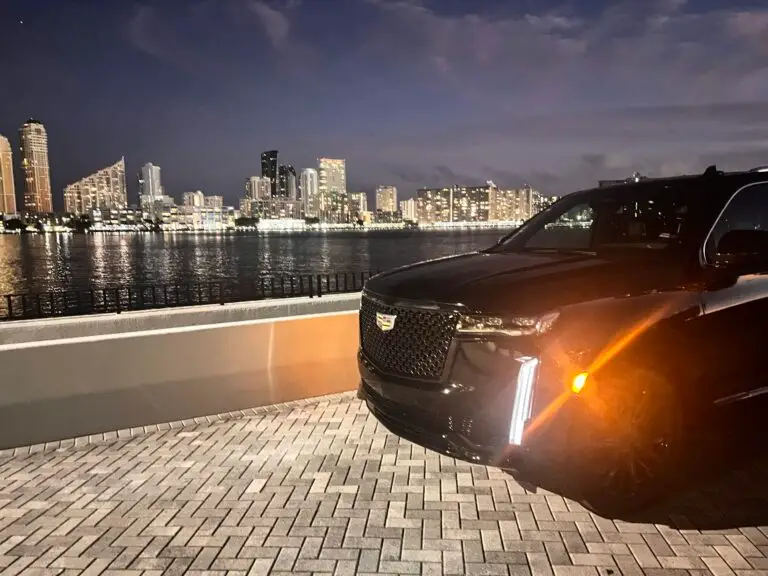 Cadillac Escalade ESV at sunset near Acqualina in Sunny Isles Beach