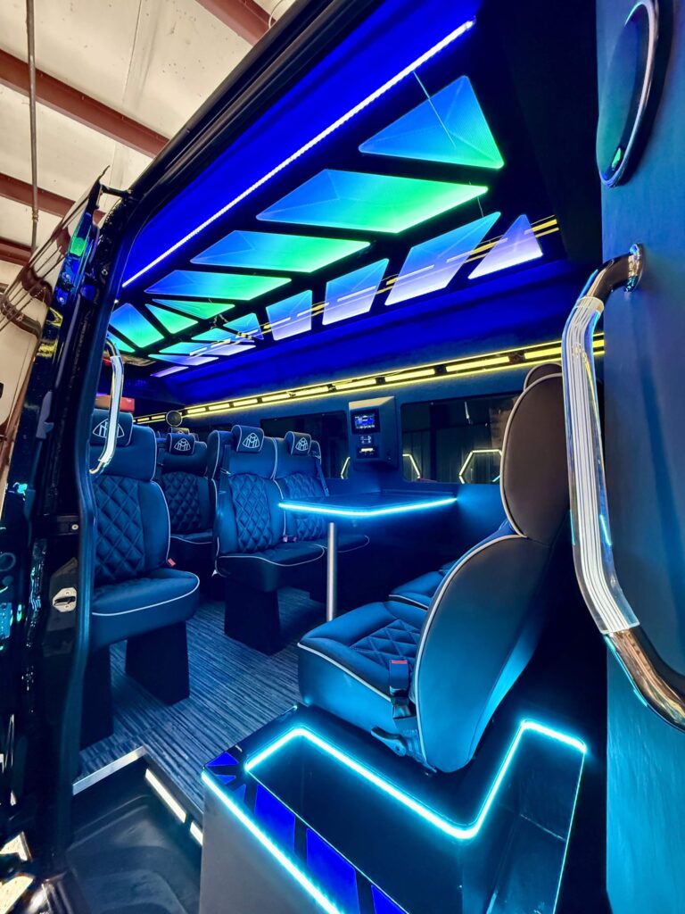 Maybach Sprinter CEO with the door open showing the blue neon interior, Miami